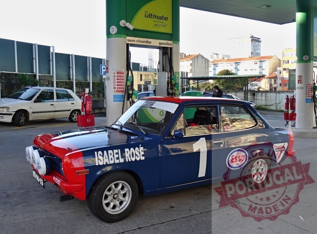 Vintage rally car refueling at a gas station | Vintage rally car pausing for fuel at a BP gas station - Realized with Pictrs.com