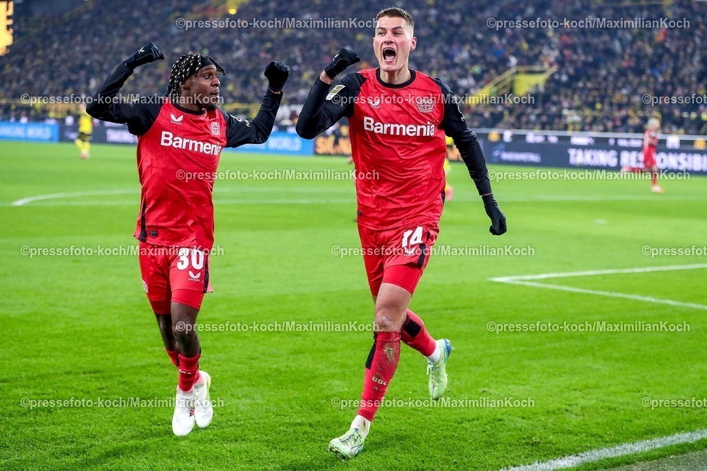 BVB10012502253 | 10.01.2025, Fußball, Borussia Dortmund - Bayer 04 Leverkusen, 1. Fußball Bundesliga, 16. Spieltag, Signal Iduna Park, Saison 2024 2025: Torjubel nach dem treffer zum 2:0 durch Torschütze Patrik Schick (Bayer04 Leverkusen #14) zusammen mit Jeremie Frimpong (Bayer04 Leverkusen #30)DFB regulations prohibit any use of photographs as image sequences and or quasi-video.