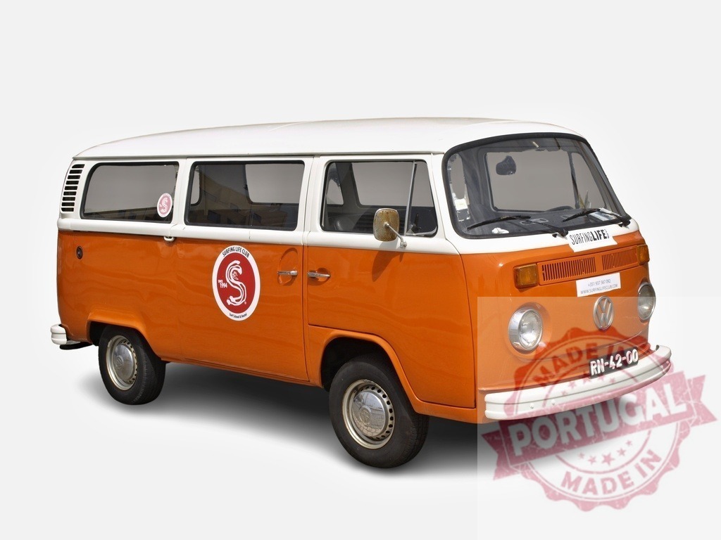 Orange and white Volkswagen Kombi van showing surf life stickers | Classic Volkswagen Kombi Type 2 van in orange and white, with surf-related stickers, parked and ready for an adventure - Realisiert mit Pictrs.com