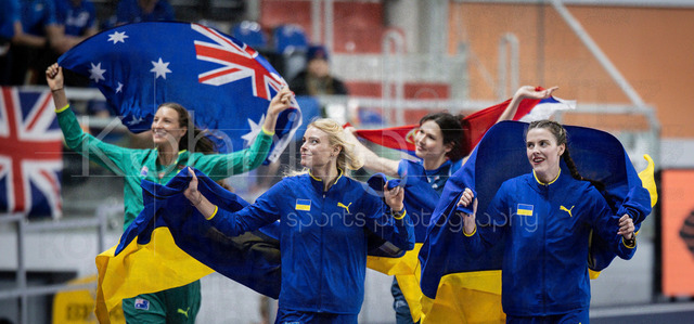World Athletics Indoor Championships Kujawy Pomorze 26, 20.03.2026 | TORUN, POLAND - MARCH 20:  Female high jumpers celebrating with their flags: 3 times 2nd place: Nicola OLYSLAGERS (AUS), Yuliia LEVCHENKO (UKR),  Angelina TOPIC (SRB), winner Yaroslava MAHUCHIKH (UKR)during the World Athletics Indoor Championships Kujawy Pomorze 26 on day 1 / session 1 at Kujawsko-Pomorska Arena Torun on March 20, 2026 in Torun, Poland. 