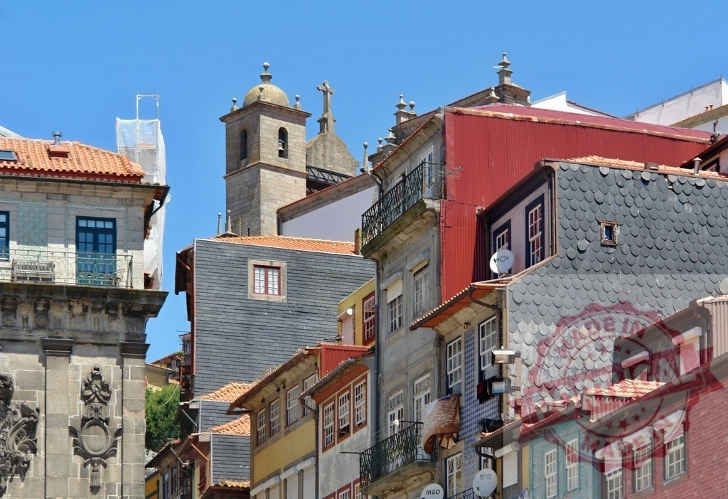 Porto cityscape with historic houses and church bell tower | Houses and traditional architecture in the historic Ribeira district of Porto, Portugal - Realized with Pictrs.com