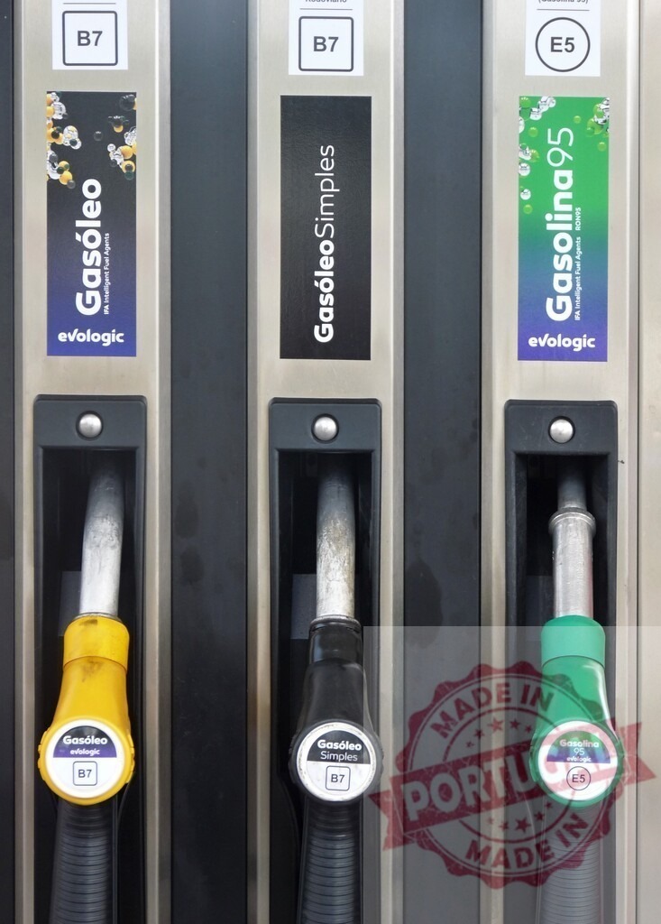 Fuel pump nozzles at a Galp gas station | Fuel nozzles at a gas station offering gasoline and diesel for vehicles - Realisiert mit Pictrs.com