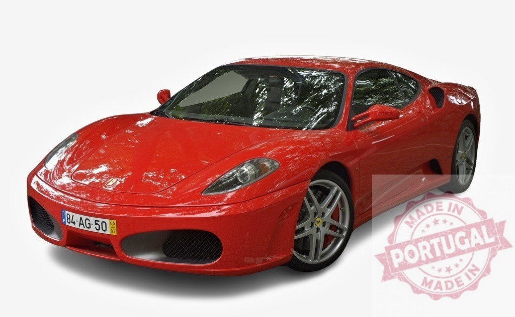 Red Ferrari F430 standing still on white background | Shiny red Ferrari F430 sportscar parked on a white background, showcasing its luxury and speed - Realized with Pictrs.com