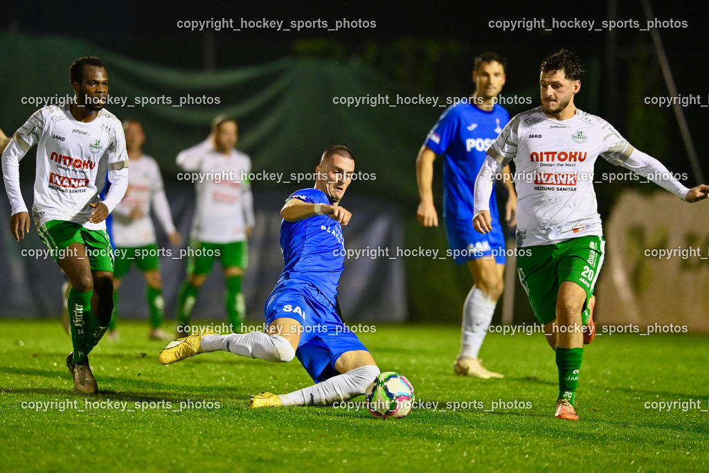 SAK vs. SV Donau  | #14 Boyo Jarjue SV Donau, #24 Zoran Vukovic SAK, #20 Nikolaus Johannes Ziehaus SV Donau, SAK vs. SV Donau , SAK vs. SV Donau  am 27.09.2024 in Klagenfurt (Sportpark Welzenegg), Austria, (Photo by Bernd Stefan)