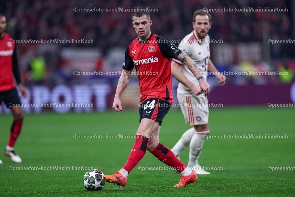 UCL11032502349 | 11.03.2025, Fußball, UEFA Champions League, Bayer 04 Leverkusen - FC Bayern München, Achtelfinale Rückspiel, BayArena, Saison 2024 2025: Granit Xhaka (Bayer04 Leverkusen #34)DFB regulations prohibit any use of photographs as image sequences and or quasi-video.