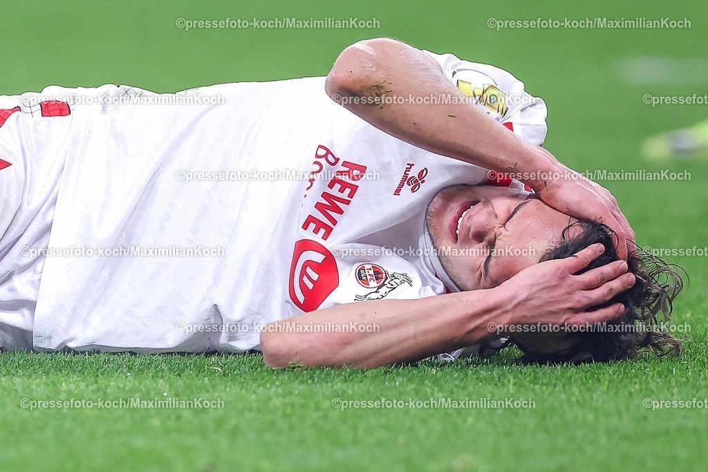 DFB05022502257 | 05.02.2025, Fußball, DFB-Pokal Viertelfinale, Bayer 04 Leverkusen - 1.FC Köln, BayArena, Saison 2024 2025: Max Finkgräfe (FC Köln #35) liegt verletzt auf dem Spielfeld. Verletzung KopfverletzungDFB regulations prohibit any use of photographs as image sequences and or quasi-video.