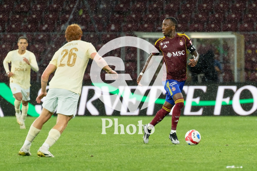 UEFA Conference League Play-offs 2nd leg - Servette FC v FC Shakhtar Donetsk | Gael Ondoua (5 Servette FC) controls the ball (action)  during the UEFA Conference League Play-offs 2nd leg match between Servette FC and FC Shakhtar Donetsk at Stade de Geneve in Geneva, Switzerland