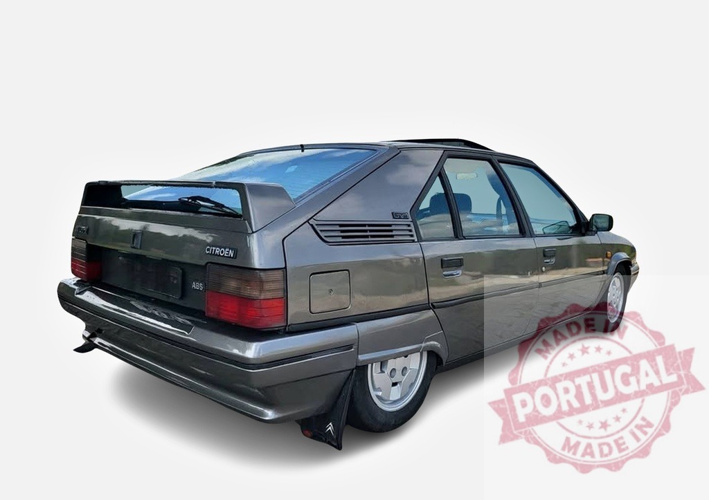 Citroën BX GTi classic French grey hatchback isolated | Citroën BX GTi sport car showing a rear view on white background - Realized with Pictrs.com