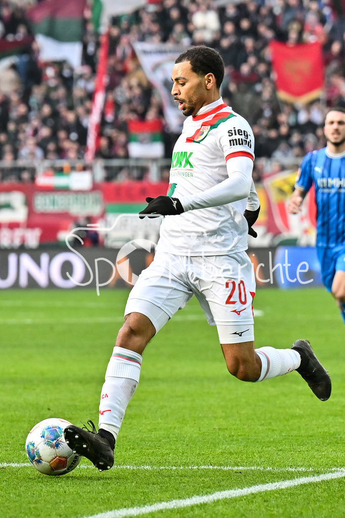FC Augsburg - 1. FC Heidenheim | AUGSBURG, GERMANY - 15. FEBRUARY: am Ball Alexis Julian CLAUDE-MAURICE (FC Augsburg 20) / Einzelfoto / Freisteller während dem Bundesligamatch zwischen dem FC Augsburg und dem 1. FC Heidenheim am 22. Spieltag in der WWK-Arena / DFL REGULATIONS PROHIBIT ANY USE OF PHOTOGRAPHS AS IMAGE SEQUENCES AND/OR QUASI-VIDEO