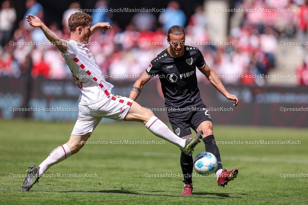 1FC20042501061 | 20.04.2025, Fußball, 1. FC Köln - Preußen Münster, 2.. Fußball Bundesliga, 30. Spieltag, RheinEnergie-STADION, Saison 2024 2025: Florian Kainz (FC Koeln #11) im Zweikampf gegen Mikkel Kirkeskov (Preussen Muenster #02) DFB regulations prohibit any use of photographs as image sequences and or quasi-video.