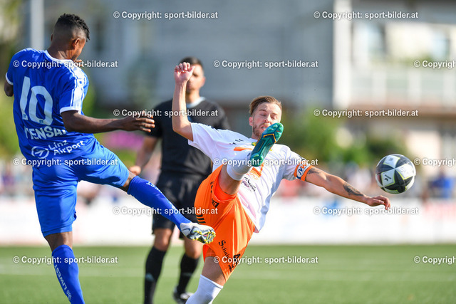 AUT, SPG Wallern / St. Marienkirchen vs FC Blau Weiss Linz | 22.07.2023, Sportplatz Wallern, AUT, OEFB Uniqa Cup, SPG Wallern / St. Marienkirchen vs FC Blau Weiss Linz, im Bild Michael Schildberger (Wallern) vs Paul Mensah (Blau Weiss Linz)



// OEFB Uniqa Cup Match between SPG Wallern / St. Marienkirchen vs FC Blau Weiss Linz in Wallern, Austria on 2023/07/22
