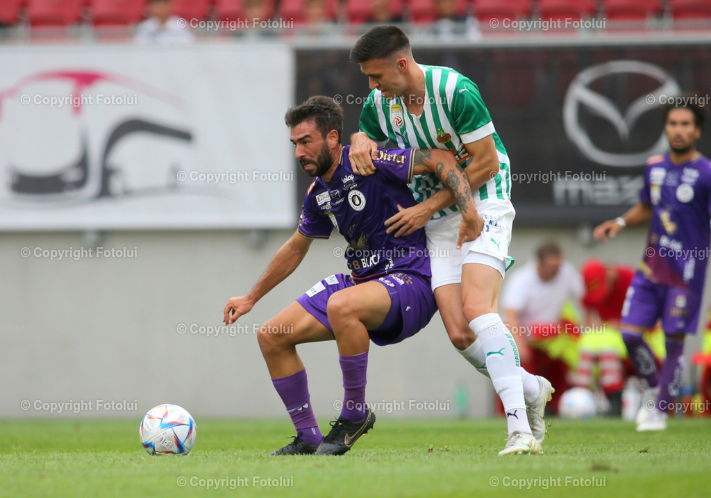 A_LUI_31072022_05 | SPORT,FUSSBALL,ADMIRAL BUNDESLIGA AUSTRIA KLAGENFURT-RAPID 31.07.2022 IM BILD: MARTIN GKEOZOS (KLAGENFURT) UND RENE KRIWAK  (RAPID) FOTO: FOTOLUI/MARIO WIMMER