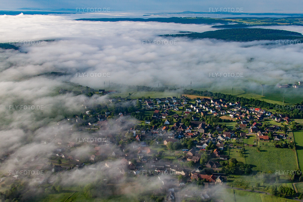 Luftbild: Ort hinter Wolken im Ortsteil Fürstenau in Höxter im Bundesland Nordrhein-Westfalen in Deutschland.Foto: IMG_65145.jpg vom 24.05.2014 durch Werner Riehm/FLY-FOTO.deAuflösung des Originals: 4536 x 3024 px