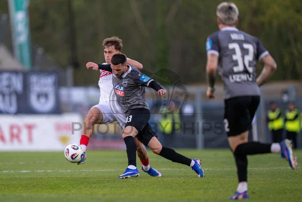 VfB Stuttgart II vs. SSV Ulm 1846 Fussball, Fussball, 3. Liga, 32. Spieltag, 08.04.2026 | Zweikampf zwischen Christopher Olivier (VfB Stuttgart II, #24) und Leon Dajaku (SSV Ulm 1846 Fussball, #43),VfB Stuttgart II vs. SSV Ulm 1846 Fussball, Fussball, 3. Liga, 32. Spieltag, 08.04.2026DFB regulations prohibit any use of photographs as image sequences and/or quasi-video