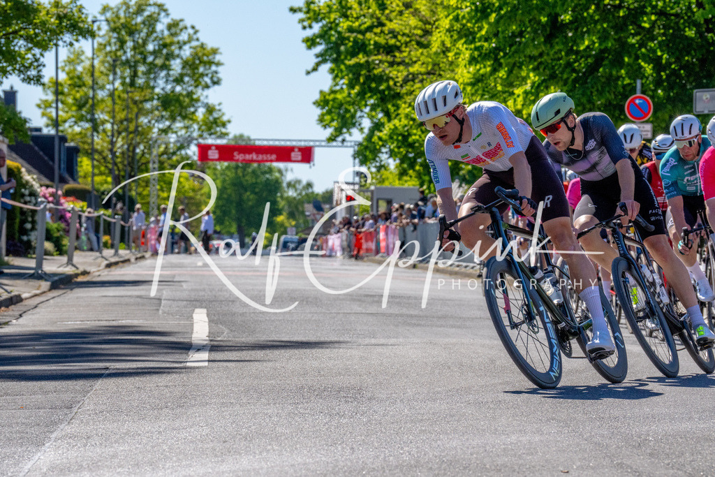 Spurt in den Mai 2026 - Großer Preis der Sparkasse Neuss | Annual one-day road cycling race "Großer Preis der Sparkasse Neuss" held in Büttgen, Germany, organized by VfR Büttgen 1912 e.V. The event features multiple races across all age categories from U11 youth to Elite men. - Realisiert mit Pictrs.com