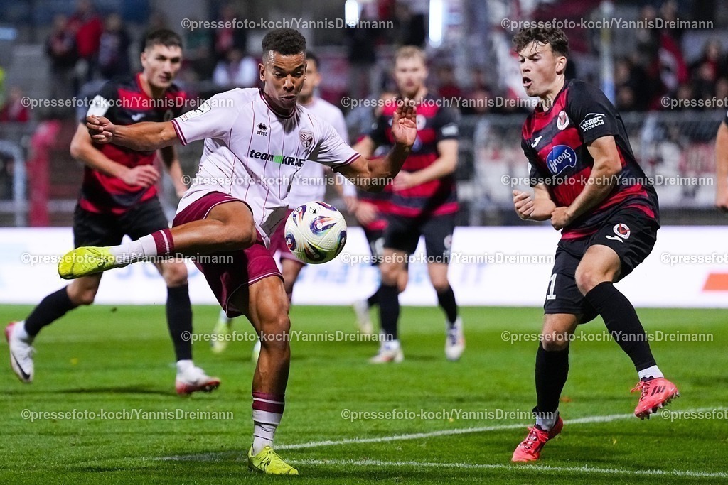 xYDR31102501045 | 31.10.2025, xydrx, Fußball, 3.Liga, FC Viktoria Köln - FC Ingolstadt 04, Saison 2025 2026, Sportpark Höhenberg: Marcel Costly (FC Ingolstadt #22) Lucas Wolf (FC Viktoria Köln #21)  DFB regulations prohibit any use of photographs as image sequences and or quasi-video.