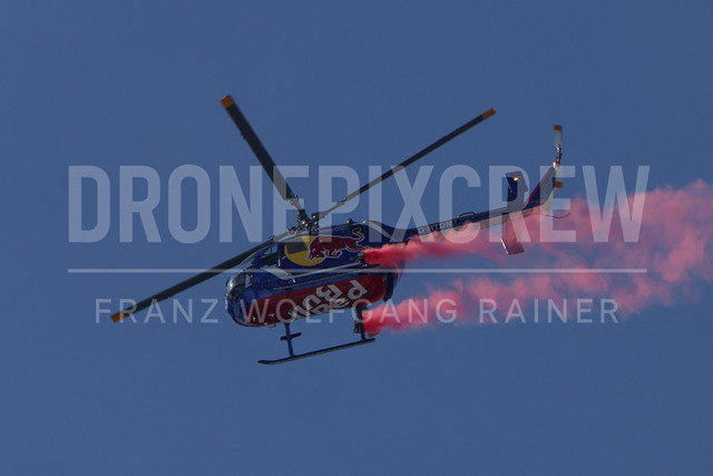 Audi FIS Ski World Cup: Men’s Slalom – Hahnenkamm Race, Kitzbuehel | Kitzbuehel, Austria, 25.Jan.26 - Alpine Skiing - FIS World Cup, Hahnenkamm Race, Slalom, men. The image shows red bull helicopter air show.