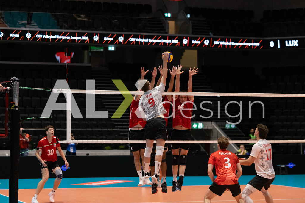 Luxembourg v Switzerland - CEV European League Men | KRIENS, SWITZERLAND - JUNE 12: CYRIL KOLB of Switzerland attack / spike against FABRICE EGGER of Switzerland in triple block during the CEV European League match between Luxembourg and Switzerland at Pilatus Arena on June 12, 2026 in Kriens, Switzerland. - Realisiert mit Pictrs.com