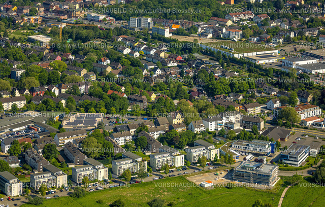 Witten240506926 | Luftbild, Wohngebiet Rosi-Wolfstein-Straße, dahinter Aldi Supermarkt mit Solardach, rechts Netto Supermarkt und Dr. Spang Ingenieurgesellschaft mit Neubau-Baustelle, Wohngebiet Ortsteil Annen bis Bahnhof Annen-Nord, hinten Centro Vital Ärztehaus Hochhaus und neues Kaufland Einkaufszentrum, Annen, Witten, Ruhrgebiet, Nordrhein-Westfalen, Deutschland