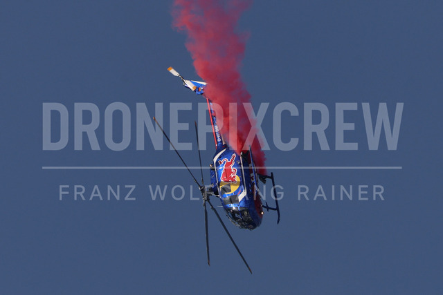 Audi FIS Ski World Cup: Men’s Slalom – Hahnenkamm Race, Kitzbuehel | Kitzbuehel, Austria, 25.Jan.26 - Alpine Skiing - FIS World Cup, Hahnenkamm Race, Slalom, men. The image shows red bull helicopter air show.