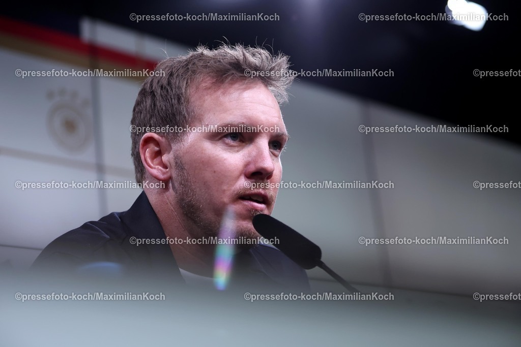 DFB23032501103 | 23.03.2025, Fußball, Viertelfinale UEFA Nations League, Deutschland - Italien, Signal Iduna Park, Saison 2024 2025: Bundestrainer Julian Nagelsmann (GER #hc) bei der Pressekonferenz nach dem SpielDFB regulations prohibit any use of photographs as image sequences and or quasi-video.