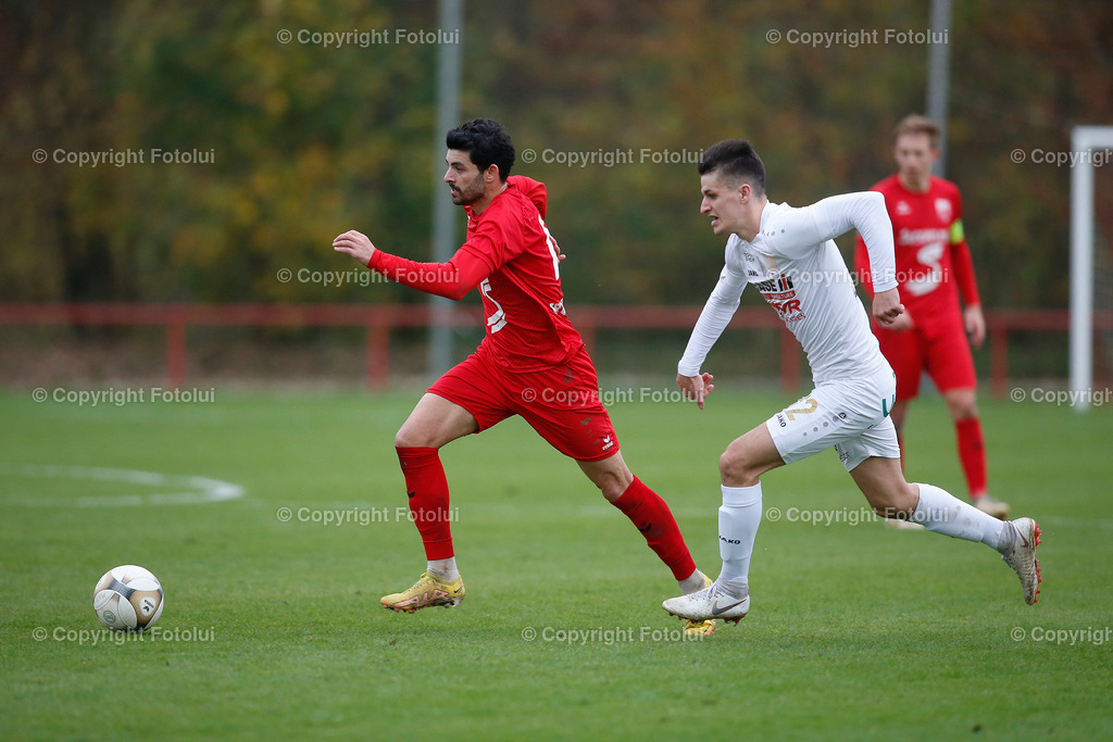 A_LUI_05112022_37 | SPORT FUSSBALL LT1 OOE LIGA ASKOE OEDT-ASK CARE IH STEYR ST.VALENTIN 05.11.2022 IM BILD: BUENYAMIN KARATAS (OEDT) UND MARCO BUEHRINGER (ASK ST.VALENTIN) FOTO:FOTOLUI