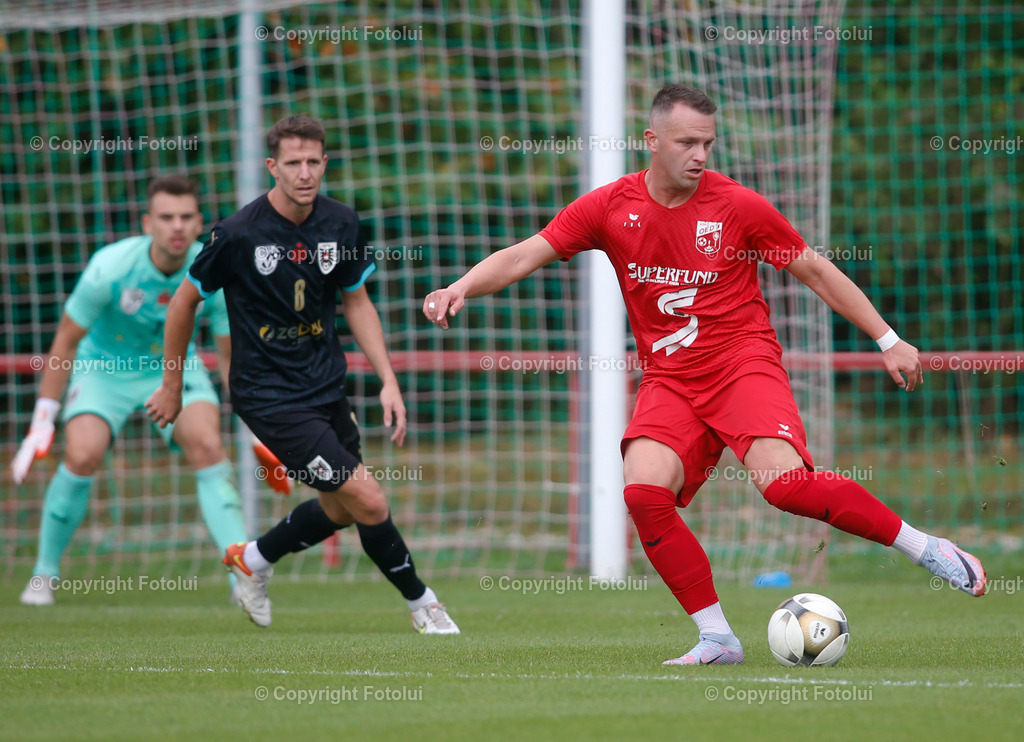 A_LUI_230923_04 | SPORT,FUSSBALL,LT1 OOELIGA ASKOE OEDT-SV ZEBAU BAD ISCHL 29.09.2023 IM BID: NENAD (OEDT) UND PATRICK AMBROSCH (BAD ISCHL)FOTO:FOTOLUI