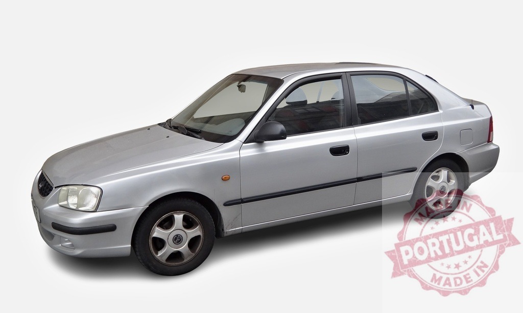Silver Hyundai Accent Hatchback Car Isolated on White Background | Studio shot of a silver Hyundai Accent hatchback car isolated on white background - Realized with Pictrs.com