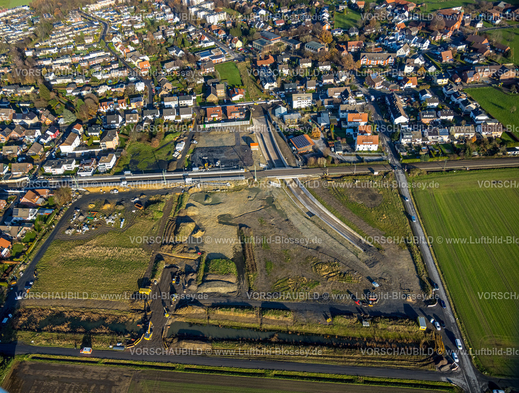 Hamm231200218 | Luftbild, geplante Nahverkehrsverbindung mit Haltepunkt in Westtünnen, Baustelle am Südfeldweg und Von-Thünen-Straße für den künftigen Bahnhaltepunkt, Wohnsiedlung, Stadtbezirk Rhynern, Hamm, Ruhrgebiet, Nordrhein-Westfalen, Deutschland