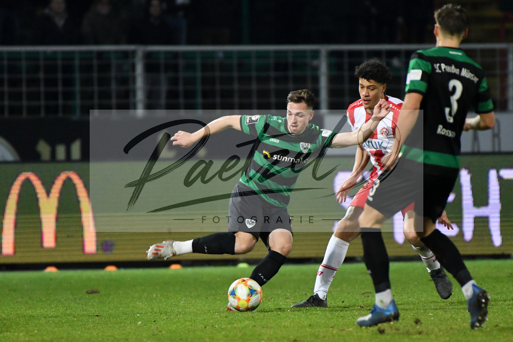 20200214_SCPFWK_0072 | Fussball, Herren: Luca Schnellbacher (SC Preussen Muenster) und Jonas David (FC Wuerzburger Kickers) im Zweikampf waehrend des Spiels der 3. Liga zwischen SC Preussen Muenster und FC Wuerzburger Kickers im Preussenstadion am 14.02.2020 in Muenster, Deutschland.DFB / DFL REGULATIONS PROHIBIT ANY USE OF PHOTOGRAPHS AS IMAGE SEQUENCES AND/OR QUASI-VIDEO. - Realisiert mit Pictrs.com