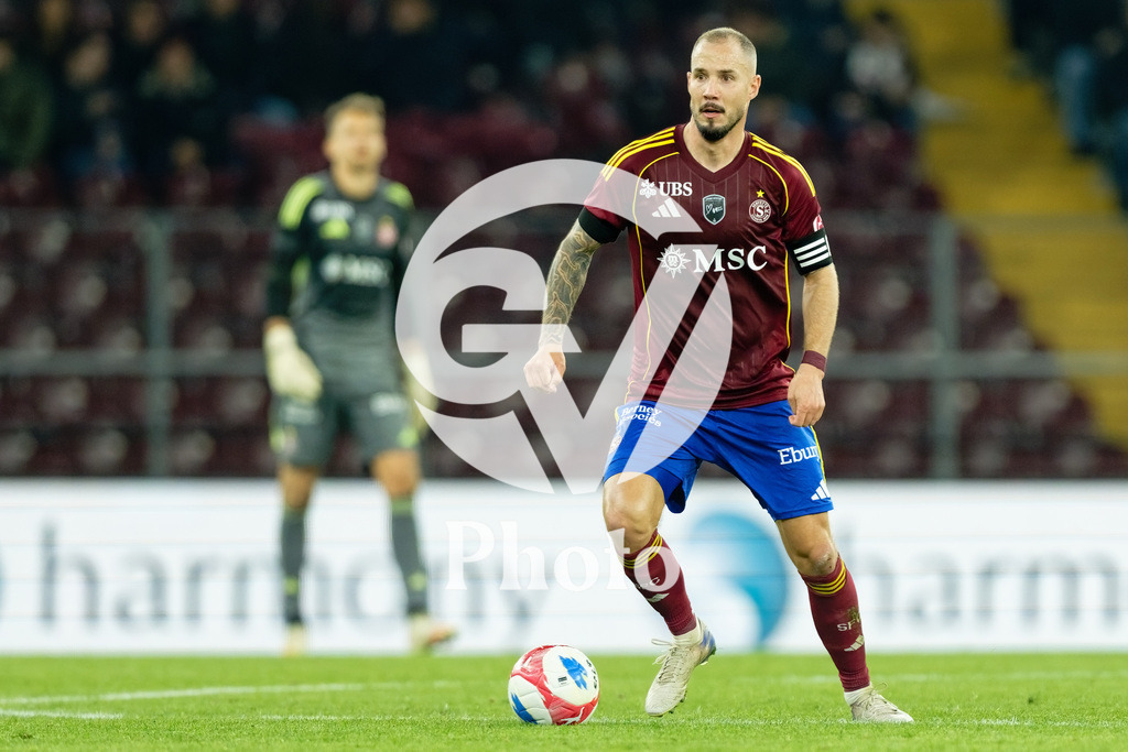 Brack Super League - Servette FC v FC Lausanne-Sport | Steve Rouiller (4 Servette FC) in action (close up)  during the Brack Super League match between Servette FC and FC Lausanne-Sport at Stade de Geneve in Geneva, Switzerland