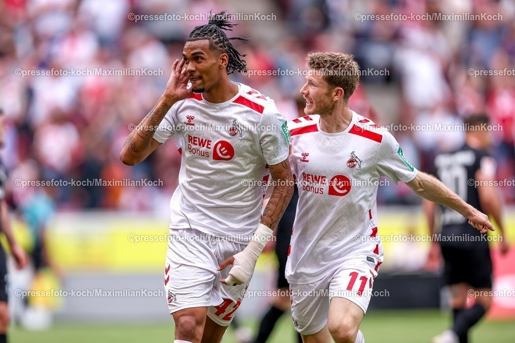 1FC20042501112 | 20.04.2025, Fußball, 1. FC Köln - Preußen Münster, 2.. Fußball Bundesliga, 30. Spieltag, RheinEnergie-STADION, Saison 2024 2025: Torjubel nach dem Tor zum 3:1 durch Torschütze Damion Downs (FC Koeln #42) zusammen mit Florian Kainz (FC Koeln #11) . DFB regulations prohibit any use of photographs as image sequences and or quasi-video.