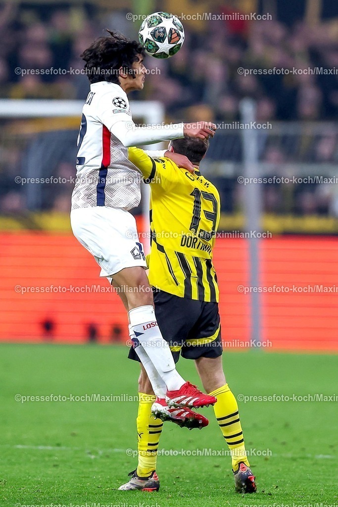 UCL04032502210 | 04.03.2025, Fußball, UEFA Champions League, Borussia Dortmund - OSC Lille, Signal Iduna Park, Runde der 16, Saison 2024 2025: Ayyoub Bouaddi (LOSC Lille #32) im Zweikampf gegen Pascal Groß (BVB #13)