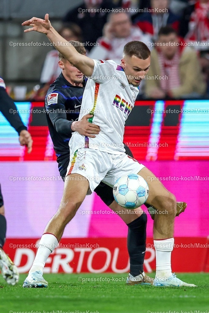 1FC05042501061 | 05.04.2025, Fußball, 1. FC Köln - Hertha BSC, 2.. Fußball Bundesliga, 28. Spieltag, RheinEnergie-STADION, Saison 2024 2025: Michael Cuisance (Hertha BSC #27) im Zweikampf gegen Tim Lemperle (FC Koeln #19) DFB regulations prohibit any use of photographs as image sequences and or quasi-video.