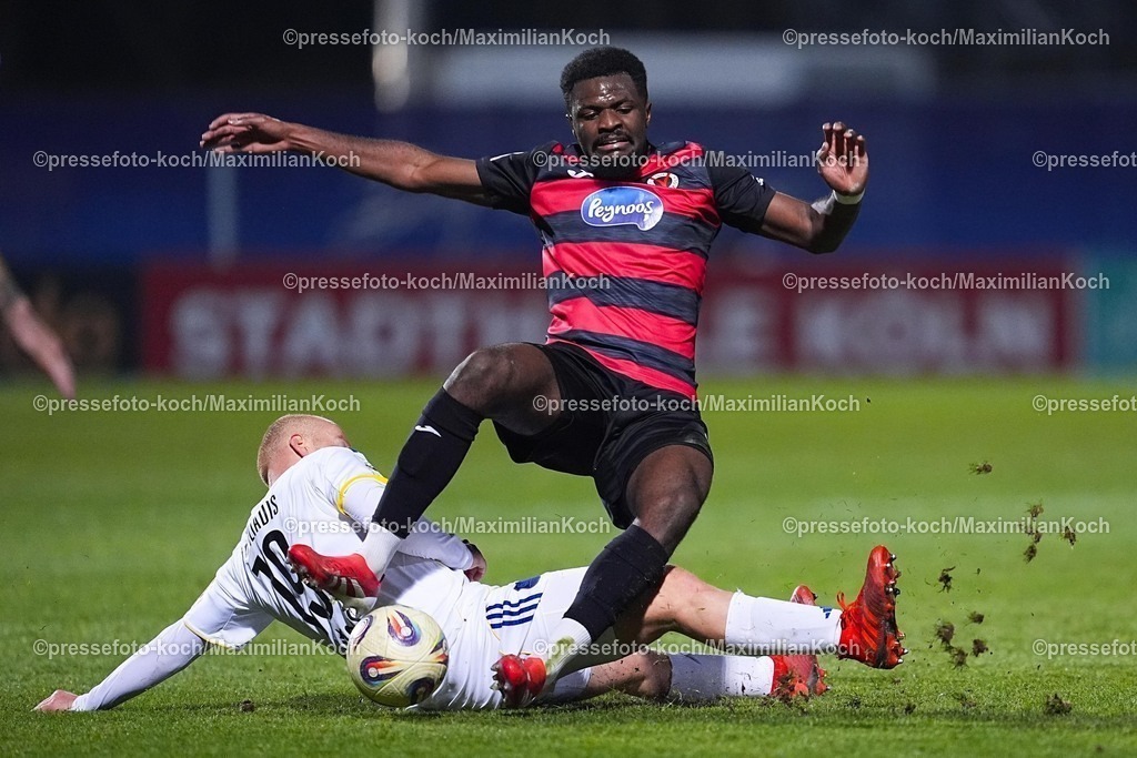 xYDRx23012601042 | 23.01.2026, xydrx, Fußball, 3.Liga, FC Viktoria Köln - 1.FC Saarbrücken, Saison 2025 2026, Sportpark Höhenberg: Verthomy Schilo Boboy (FC Viktoria Köln #22) im Zweikampf gegen Sebastian Vasiliadis (1.FC Saarbrücken #19)    DFB regulations prohibit any use of photographs as image sequences and or quasi-video. Photo: xYannisxDreimannxPressefotoKochx