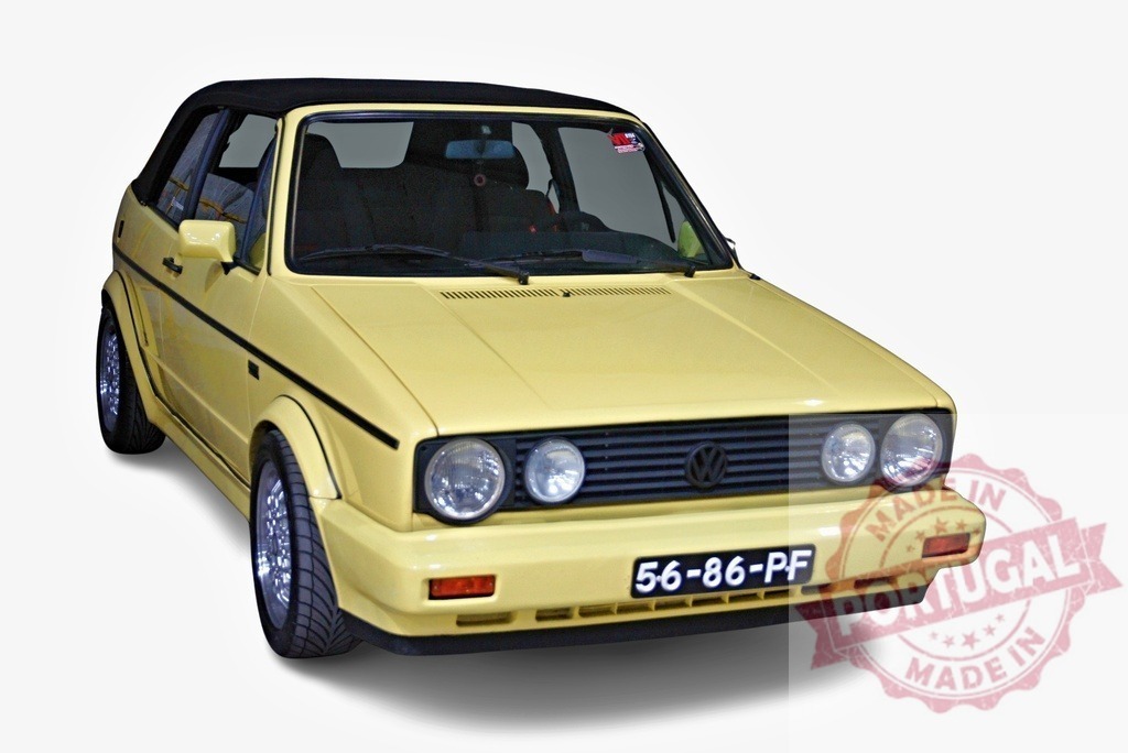 Yellow Volkswagen Golf Cabriolet parked with closed black roof | Classic Volkswagen Golf Cabriolet with a closed black roof, parked on a white background - Realized with Pictrs.com