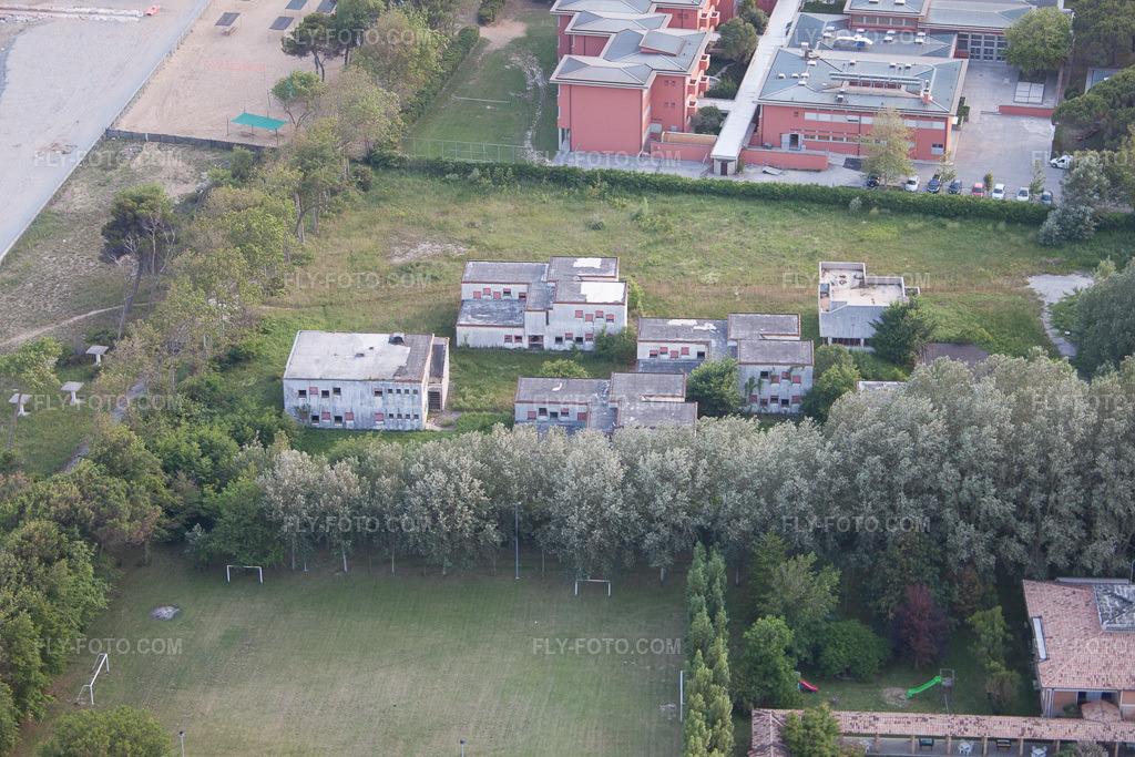 Aerial view: A dilapidated former family holiday home, ex Colonia La Nostra Famiglia, on the Adriatic coast in Duna Verde in the state Veneto, Italy.Photo: IMG_50296.jpg taken on 06/07/2012 by Werner Riehm/FLY-FOTO.comResolution of the original: 4752 x 3168 px