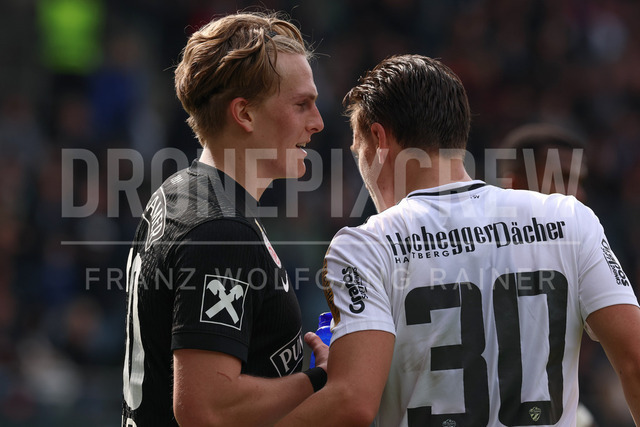 SK Puntigamer Sturm Graz vs TSV Egger Glas Hartberg – Championship Group    | Graz, Austria, 12.Apr.26 - SOCCER - ADMIRAL Bundesliga, SK Puntigamer Sturm Graz vs TSV Egger Glas Hartberg. The image shows Paul-Friedrich Koller (STU) and Lukas Fridrikas (Hartberg) haveing conversation.    