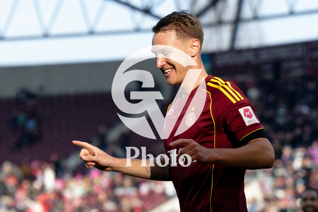Brack Super League - Servette FC v FC Zurich | Marco Burch (15 Servette FC) celebrates after scoring his team's first goal portrait (headshot/close up)  during the Brack Super League match between Servette FC and FC Zurich at Stade de Geneve in Geneva, Switzerland