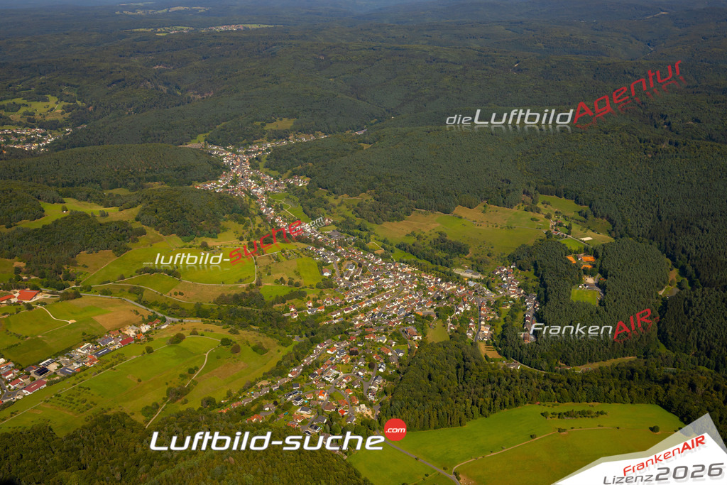 Das Luftbild zeigt :  Heimbuchenthal - Die Luftaufnahme wurde 2024 vom UL-Flugzeug aus erstellt ( keine Drohne ) - Hochauflösende Luftaufnahme - Für grossformatige Ausdrucke geeignet. Die Geschenkidee !Mit Lizenz und Bildrechte bestellbar