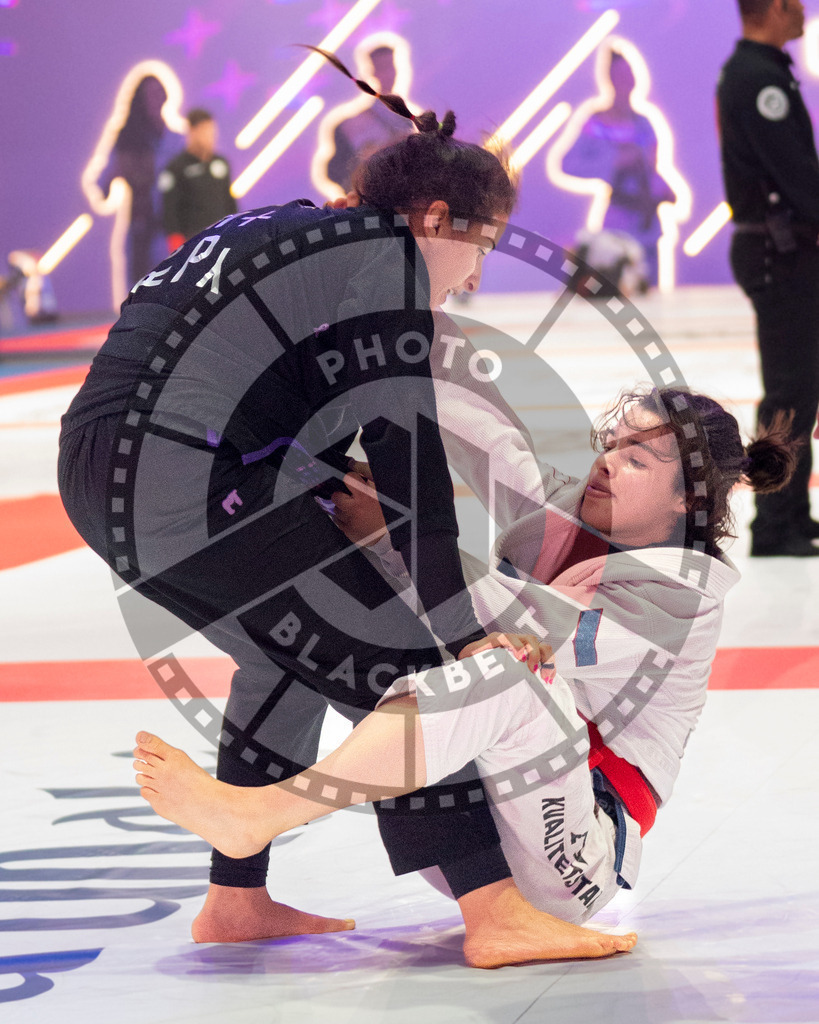 20231109PBB3771 | Fighters compete during the AJP World Professional Championship in the Mubadala Arena in Abu Dhabi, Arab United Emirates, on November 9, 2023.