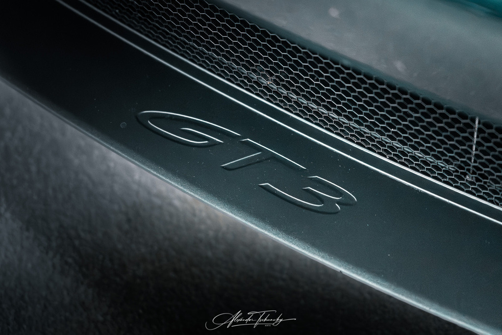 911 GT3 Touring Arlogrünmetallic | Entdecken Sie die faszinierende Welt von Alexander Tschuncky Arts: Kreative Fotografie, atemberaubende Automobilkunst und hochwertiger Bilderdruck. Lassen Sie sich inspirieren! - Realisiert mit Pictrs.com