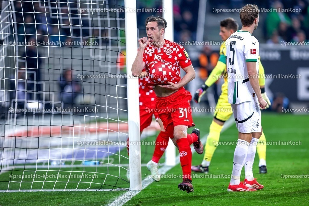 BMG07032501078 | 07.03.2025, Fußball, Borussia Mönchengladbach - 1.FSV Mainz 05, 1. Fußball Bundesliga, Borussia-Park, Saison 2024 2025: Torjubel nach dem 2:0 durch Dominik Kohr (Mainz05 #31). DFB regulations prohibit any use of photographs as image sequences and or quasi-video.
