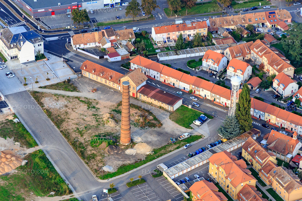 Aerial view: Old chimney and water tower on Rue du Maréchal Joffre in Bischwiller in the state Bas-Rhin, France.Photo: IMG_074265.jpg taken on 10/04/2014 by Werner Riehm/FLY-FOTO.comResolution of the original: 5221 x 3480 px