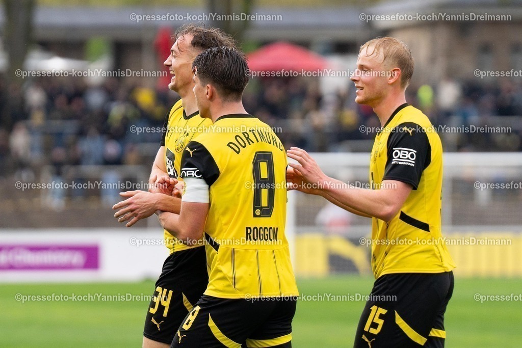 xydr13042501027 | 13.04.2025, xydrx, Fußball, Borussia Dortmund II - FC Energie Cottbus, 3.Liga, Stadion Rote Erde, Saison 2024 2025: : Yannik Luehrs (Borussia Dortmund II #34)Ben Huening (Borussia Dortmund II #15) Franz Roggow (Borussia Dortmund II #8) jubelnd, freuen sich über das Tor zum 2:0 für Dortmund DFB regulations prohibit any use of photographs as image sequences and or quasi-video.
