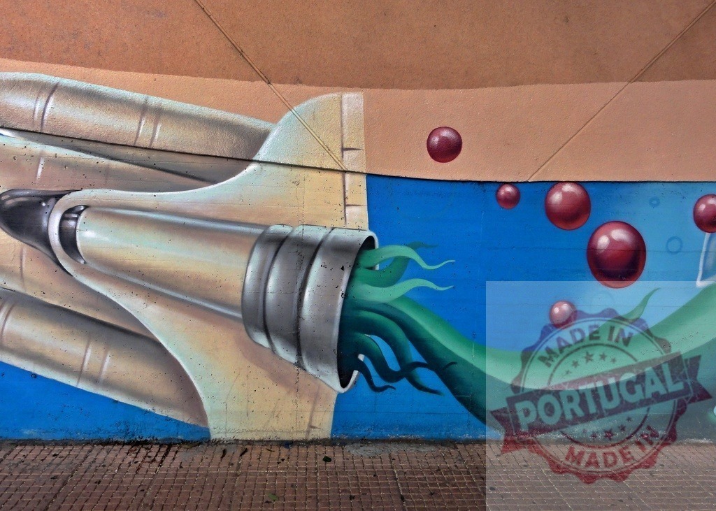 Street art mural showing space shuttle octopus tentacles | Space shuttle engine creating green octopus tentacles in a surreal street art mural - Realized with Pictrs.com
