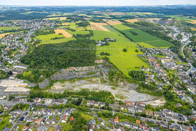 Warstein240713300 | Luftbild, Steinbruch Steinwerke F. J. Risse GmbH & Co. KG Betonwerk im NSG Oberhagen, Wohngebiet und Bundesstraße B55, Suttrop, Warstein, Sauerland, Nordrhein-Westfalen, Deutschland