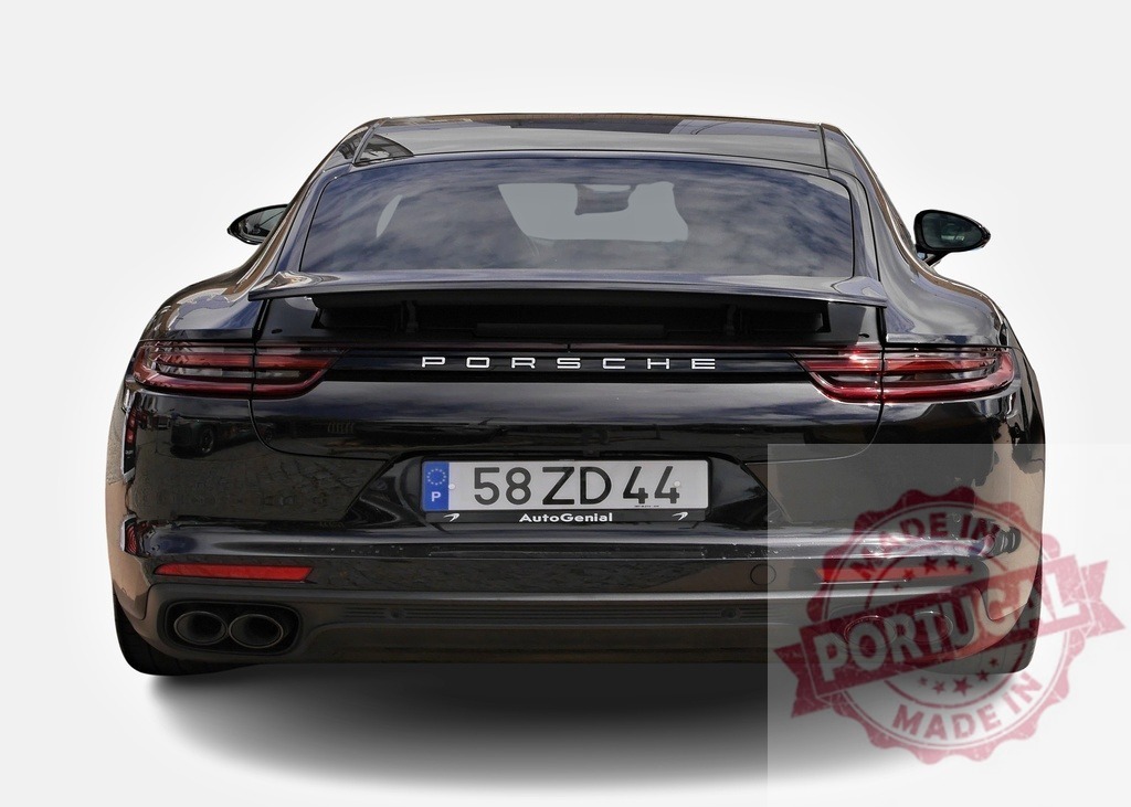 Rear view of black Porsche Panamera parking, showing exhaust pipes and spoiler | Back view of a Porsche Panamera with visible exhaust pipes, spoiler, and tinted windows - Realisiert mit Pictrs.com
