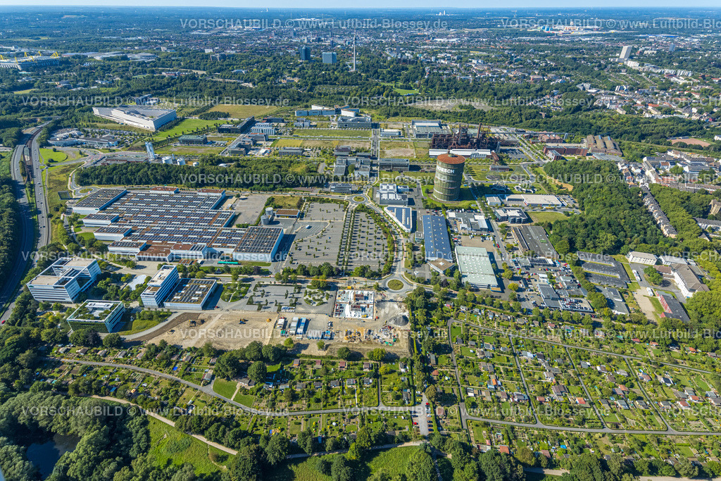 Dortmund240804069 | Luftbild, Technologiepark Gewerbegebiet Phoenix West, Gesamtansicht und Blick zum Westfalenpark mit Florianturm, Hörde, Dortmund, Ruhrgebiet, Nordrhein-Westfalen, Deutschland