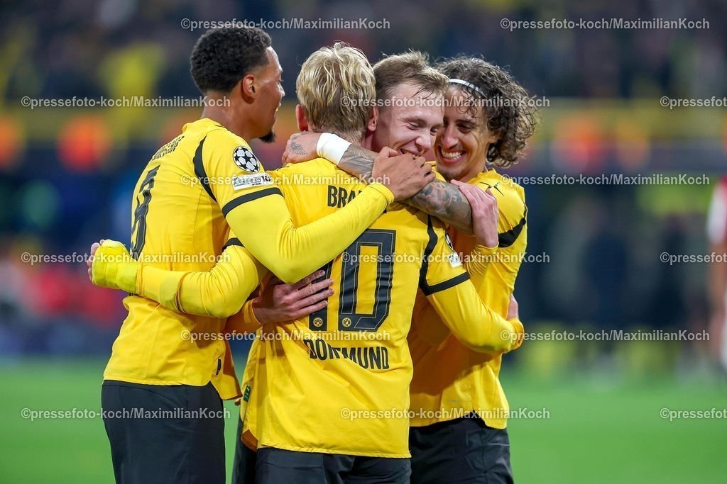 UCL01102501129 | 01.10.2025, Fußball, UEFA Champions League, Borussia Dortmund - Athletic Club Bilbao, BVB Stadion, 2. Spieltag, Saison 2025 2026: Torjubel nach dem Tor zum 4:1 durch Torschütze Julian Brandt (BVB #10)  zusammen mit  Felix Nmecha (BVB #08) Maximilian Beier (BVB #14) Fabio Silva (BVB #21) Regulations prohibit any use of photographs as image sequences and or quasi-video.